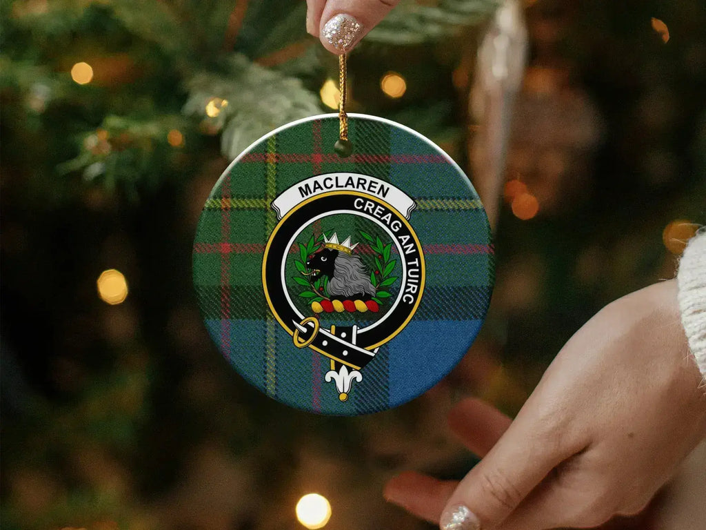 MacLaren Creag An Tuirc family crest ornament in hand — shows scale and double-sided print detail