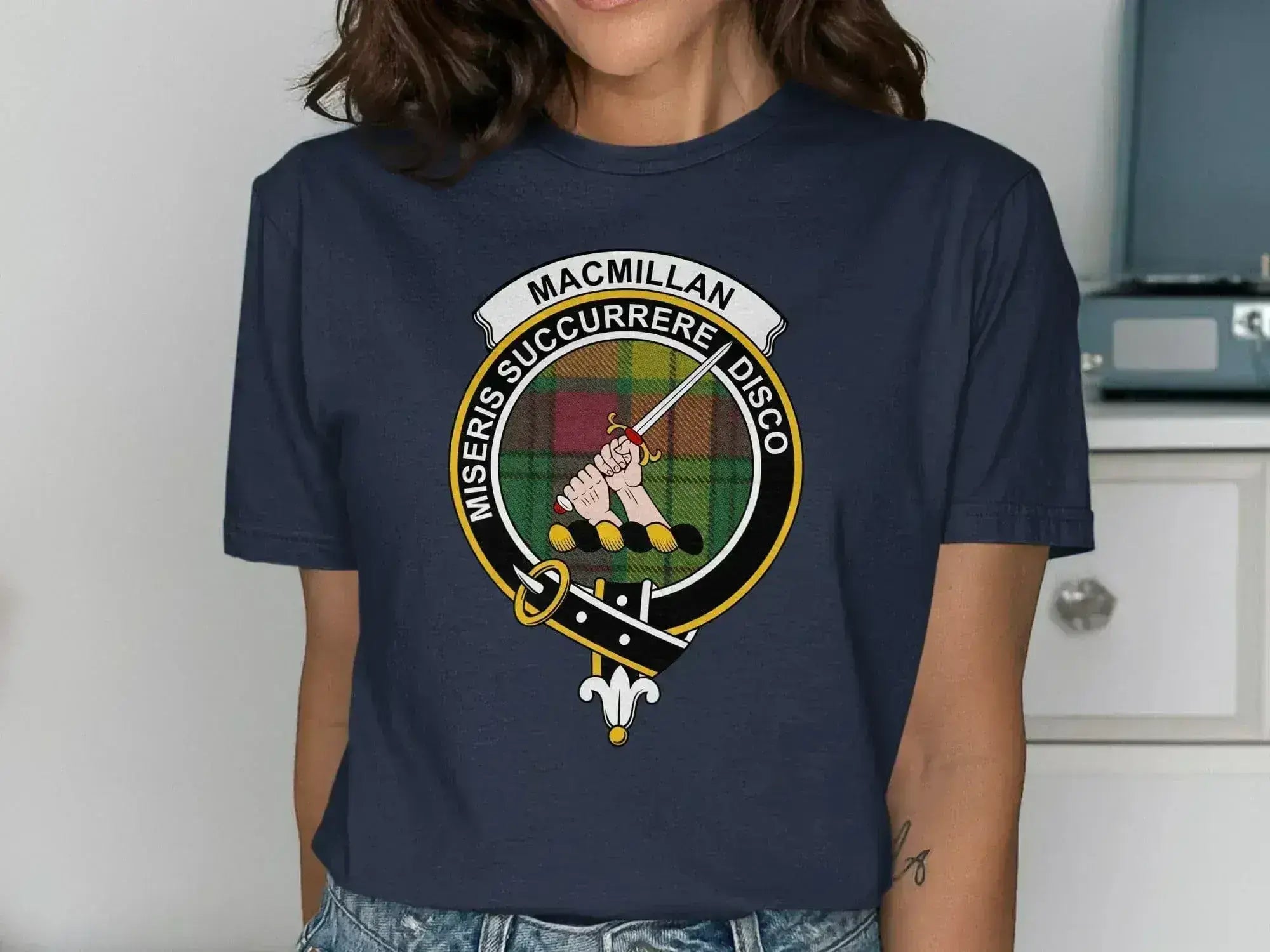 MacMillan clan crest t-shirt in black — front view showing tartan badge print