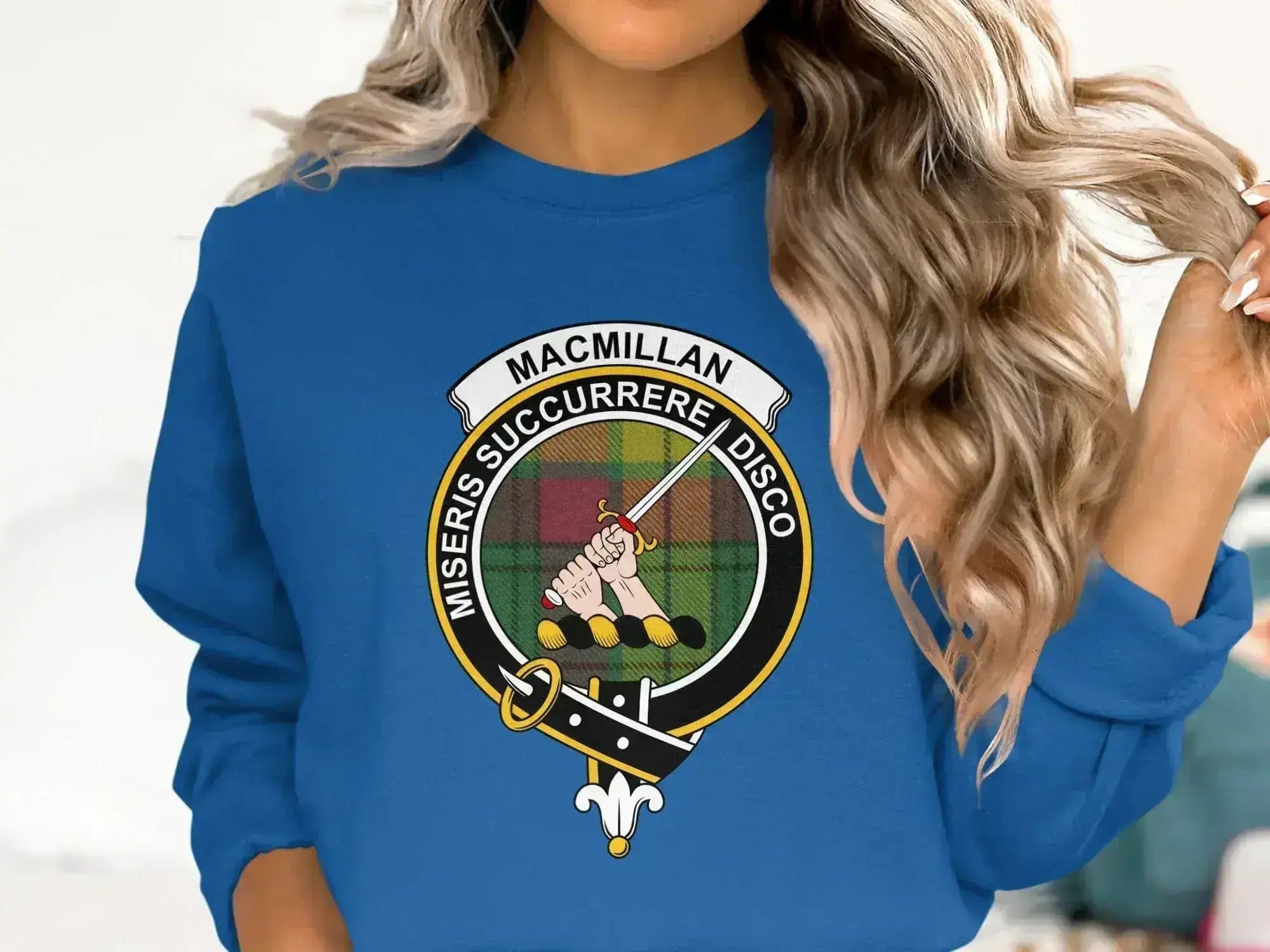MacMillan tartan crewneck sweatshirt in royal blue — ribbed cuffs and waistband with clan crest