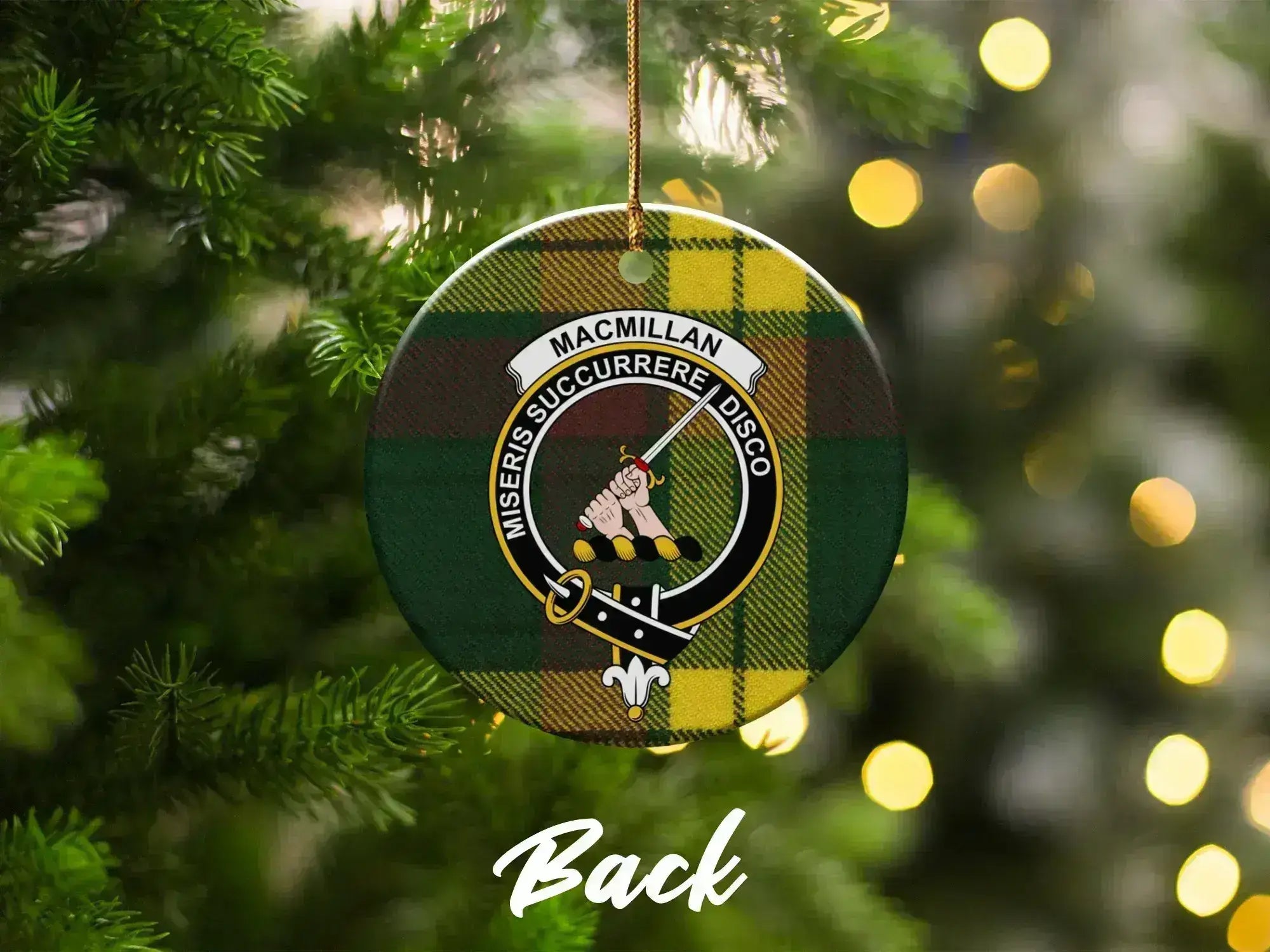 Clan MacMillan ceramic ornament on Christmas tree — green and yellow tartan crest design