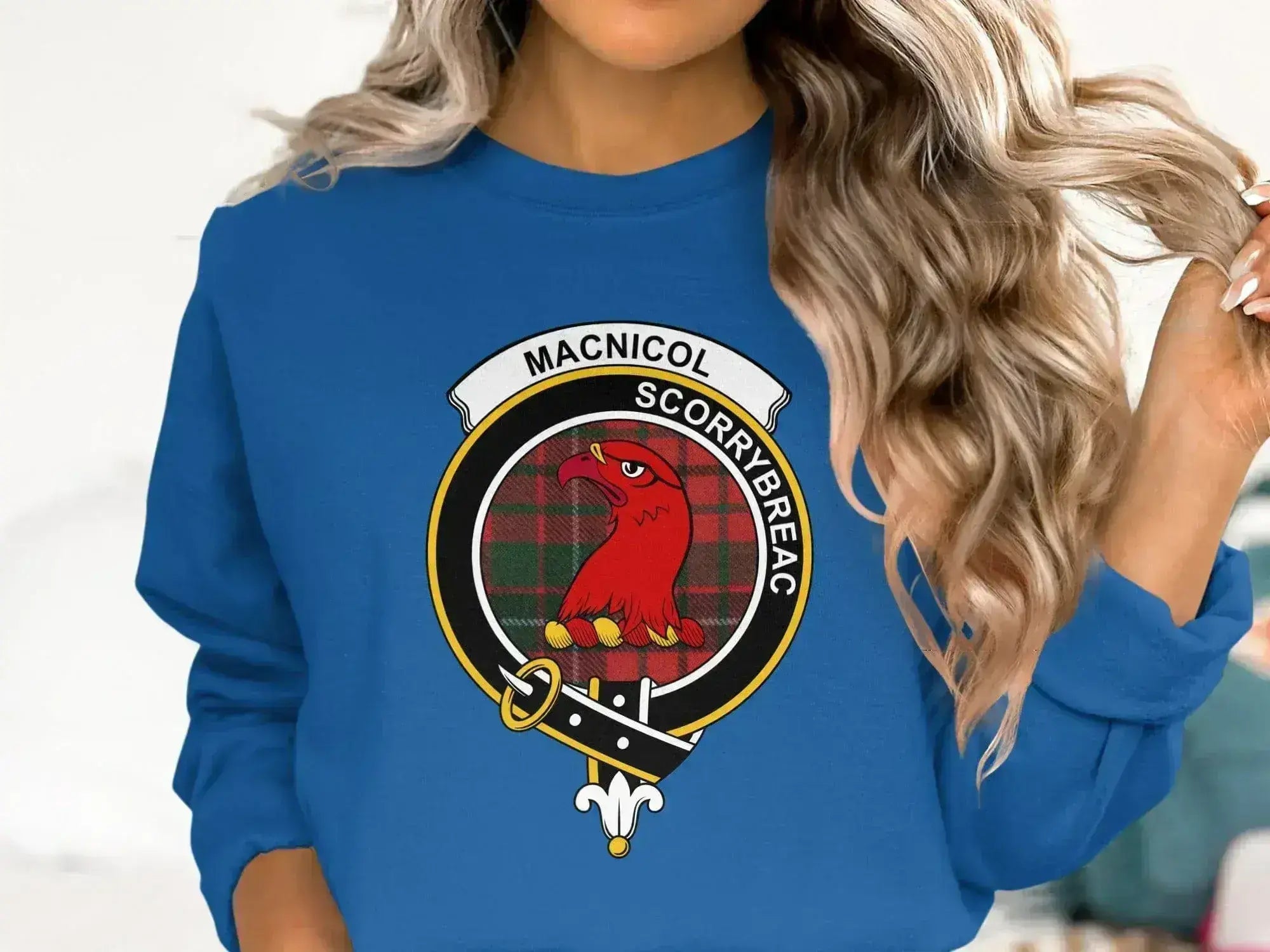 MacNicol crest sweatshirt — black crewneck with printed Scorrybreac tartan design