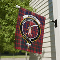 Clan MacRae tartan garden flag displayed outdoors — 12x18 inch poly poplin-canvas with clan crest