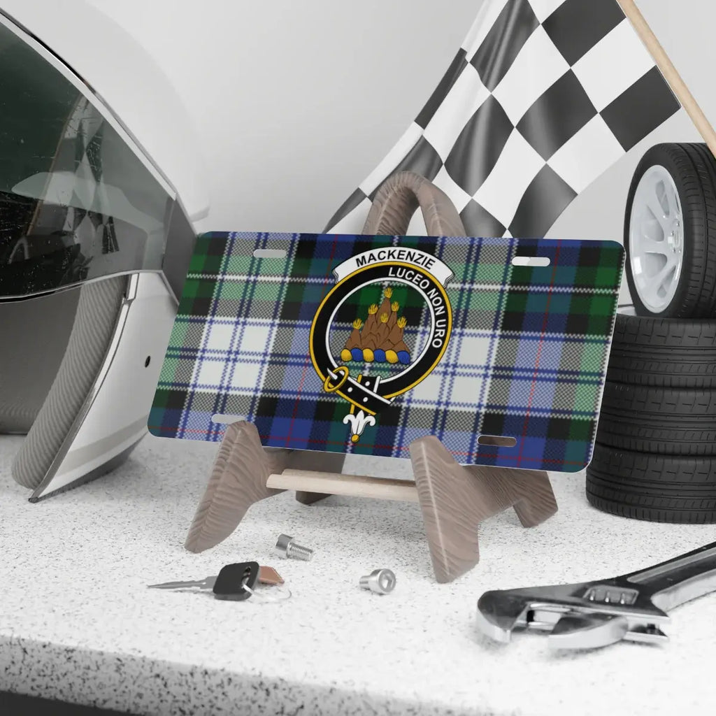 MacKenzie Luceo Non Uro plaid clan crest novelty license plate — 12x6 aluminium with heraldic design