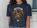 Clan MacKinnon crest printed on royal blue t-shirt — wild boar and tartan unisex cotton tee