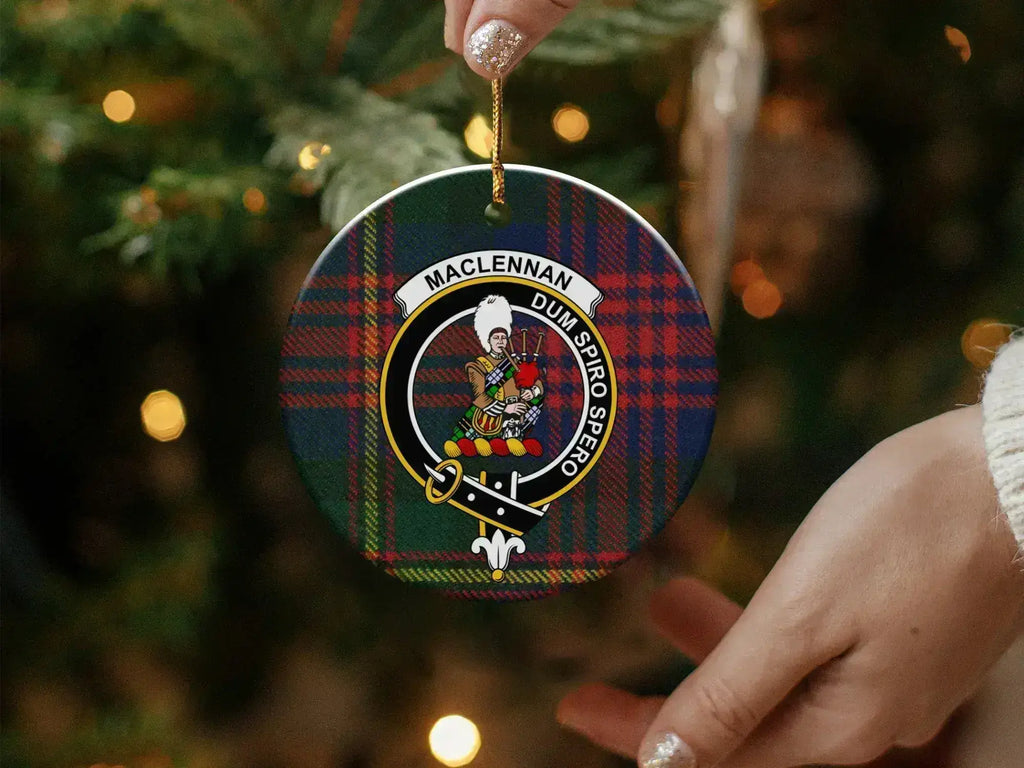 MacLennan clan crest ornament in hand — shows scale and double-sided Dum Spiro Spero print