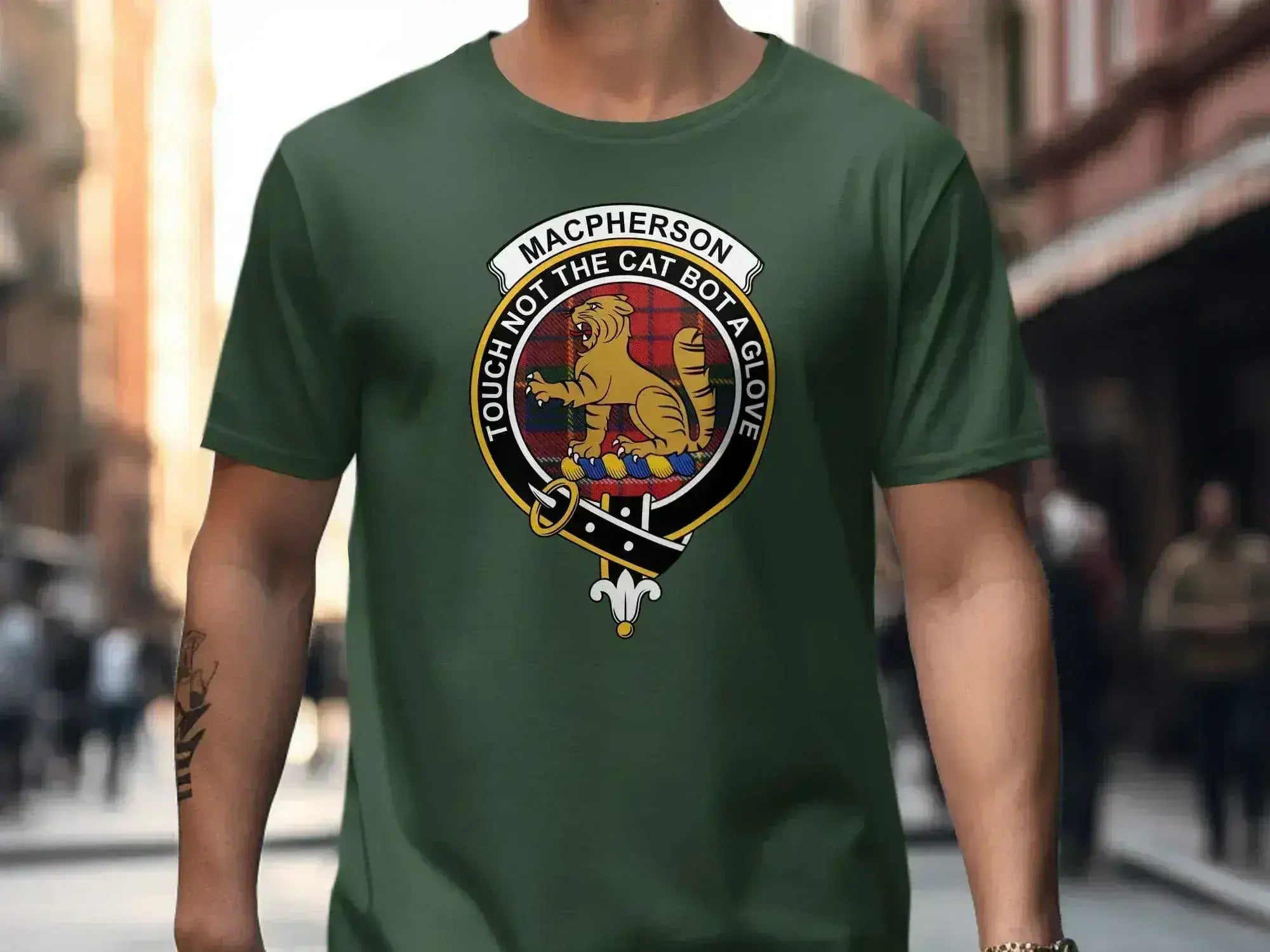 MacPherson clan crest tartan tee in royal blue — cotton short sleeve with cat crest print