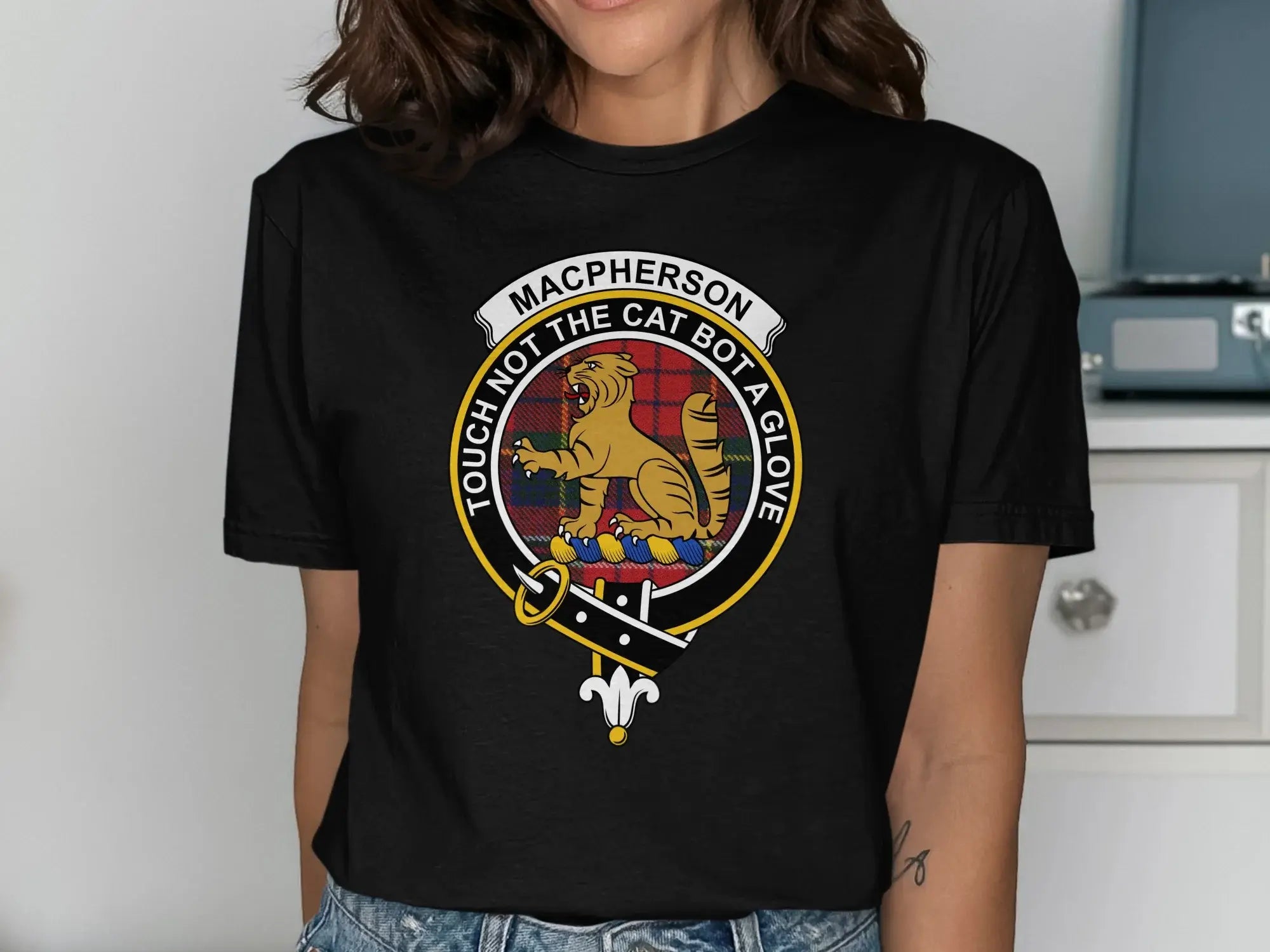 Clan MacPherson t-shirt in forest green — cat crest and tartan graphic on relaxed unisex cotton tee