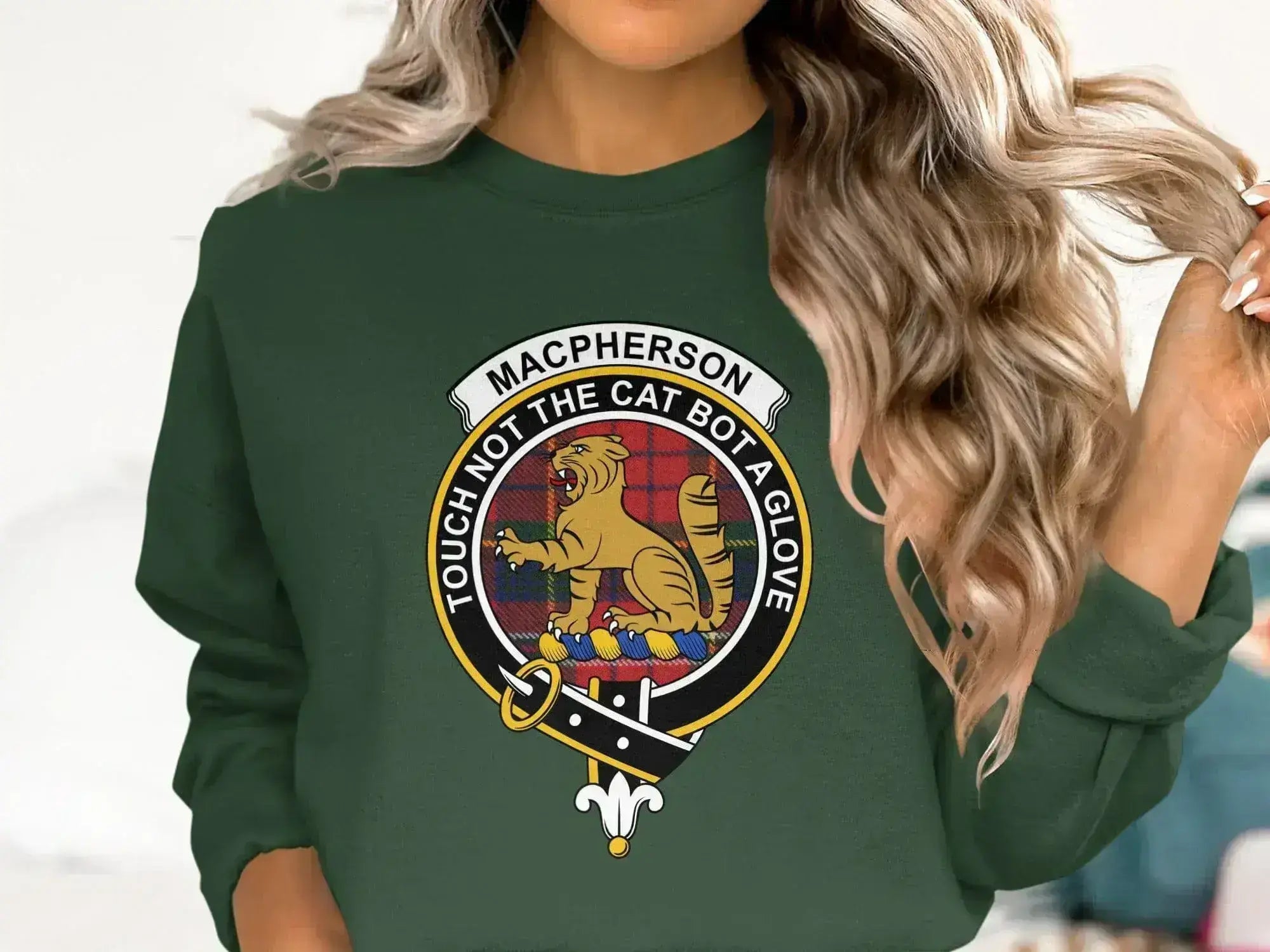 MacPherson clan crest sweatshirt in navy — fleece crewneck with Scottish tartan cat crest print