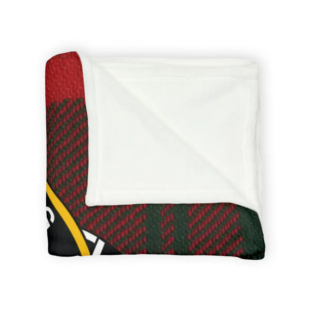 MacQuarrie tartan blanket — close-up of red and green checkered clan tartan print and hemmed edge