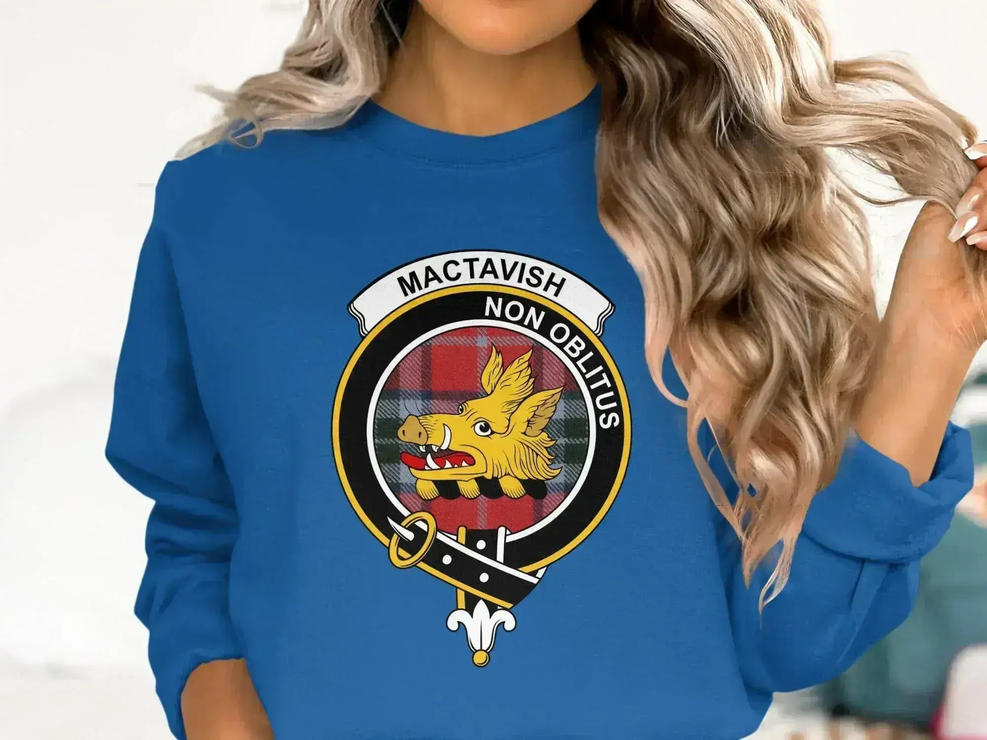 MacTavish clan crest sweatshirt in royal blue — fleece crewneck with printed boar and tartan