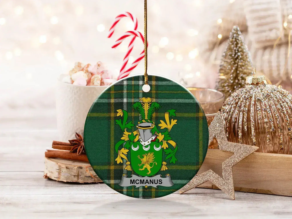 McManus Irish surname tartan ornament with crest-style emblem