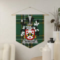 McMillan Irish family crest wall pennant — crest on the Irish national tartan