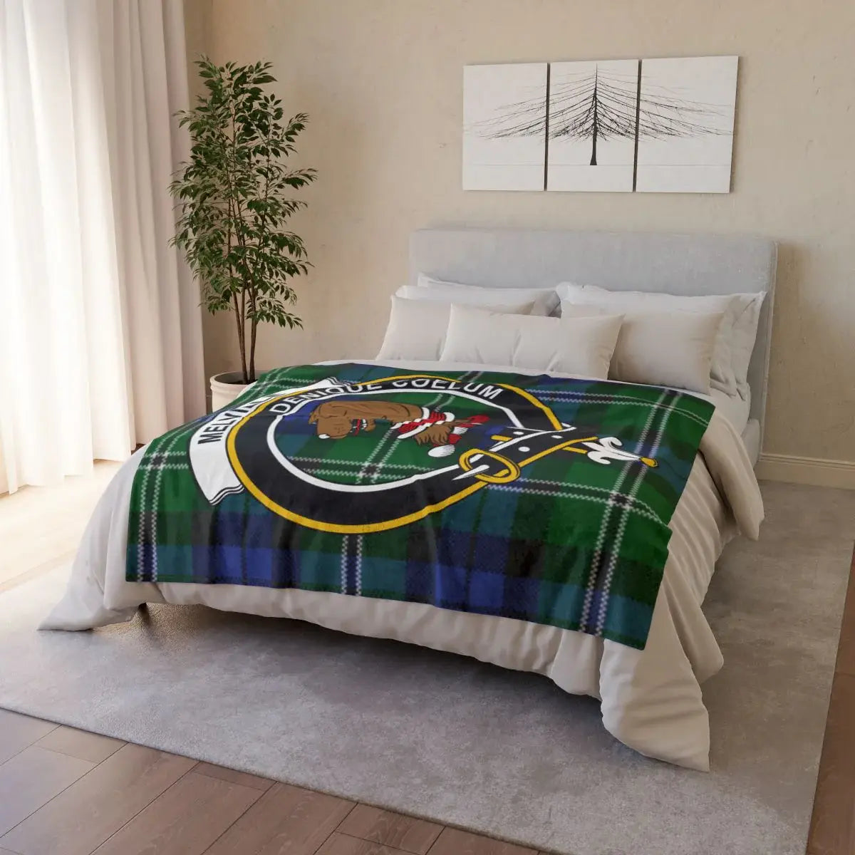 Melville clan crest throw on sofa — printed tartan design, white reverse, hemmed edges