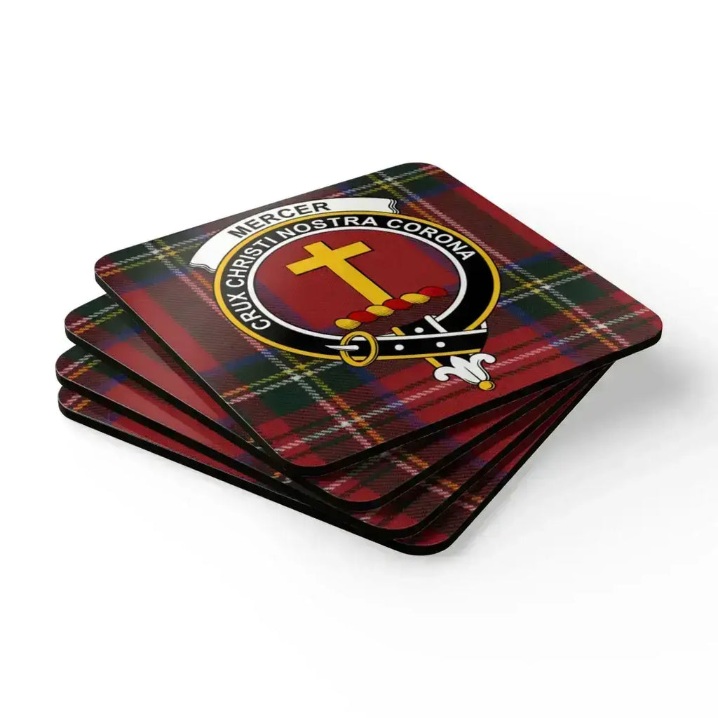 Mercer clan crest coasters on table — Scottish tartan pattern, set of four