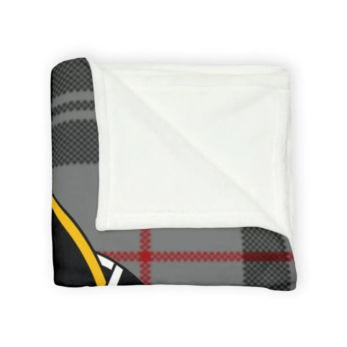 Clan Moffat throw blanket draped over chair — red and black tartan crest print, soft polyester