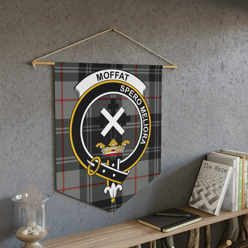 Moffat Spero Meliora crest pennant on wall — laser-cut edges, bold tartan colours