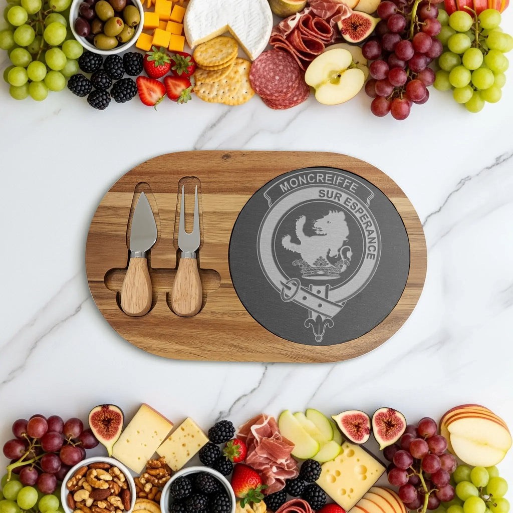 Moncreiffe clan crest acacia and slate charcuterie board styled with food — engraved Scottish heritage serving board