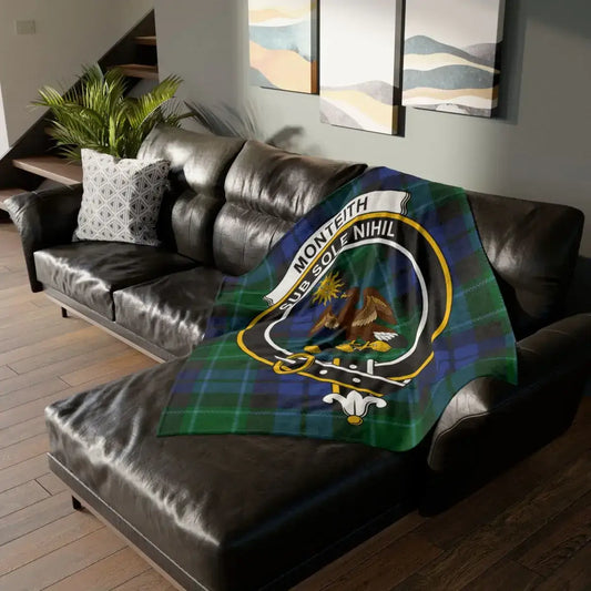 Cozy Green Checkered Blanket with Emblem Design