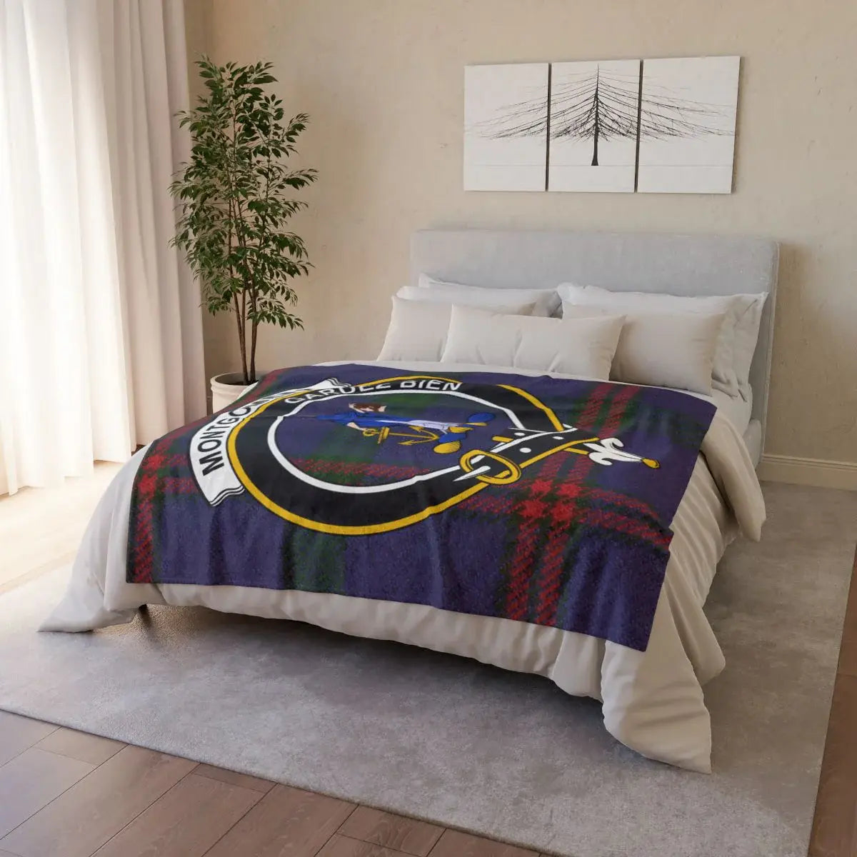 Montgomery clan crest tartan throw blanket on bed — printed polyester with white reverse and hemmed edges