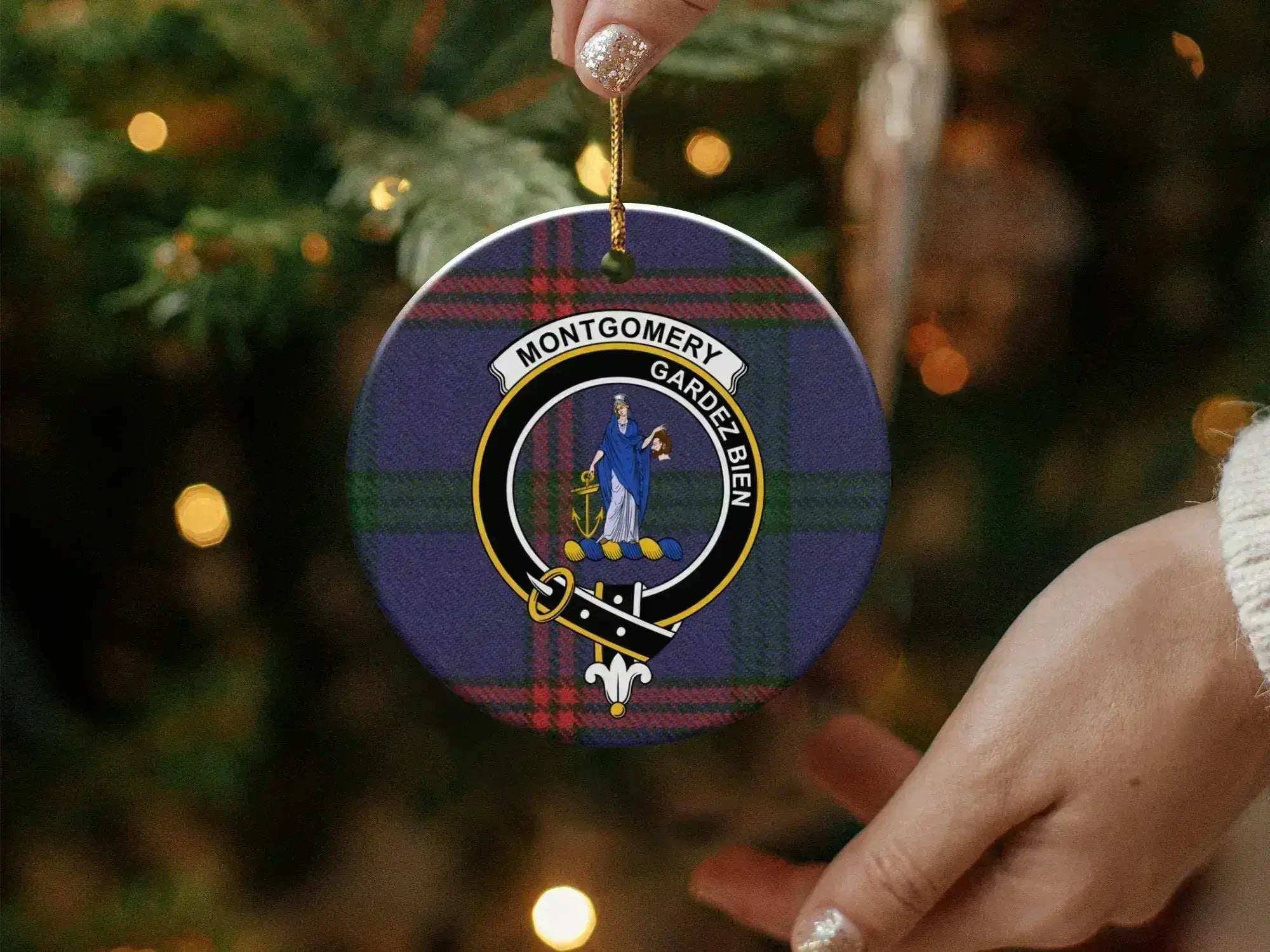Montgomery clan crest tartan ceramic ornament showing pre-drilled hang hole and gold cord