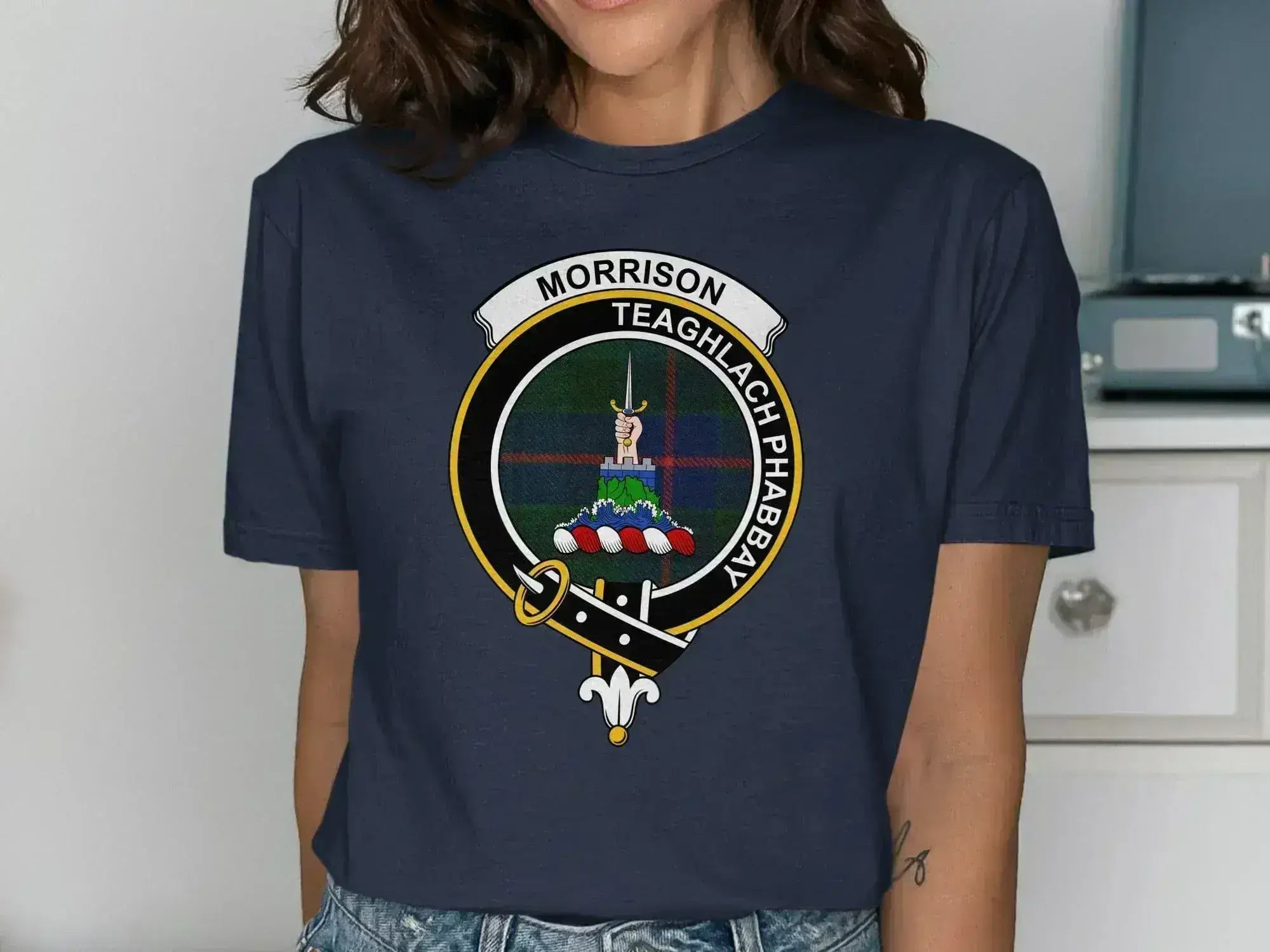 Morrison Teaghlach Phabbay clan crest t-shirt in navy — front view showing clan tartan badge print