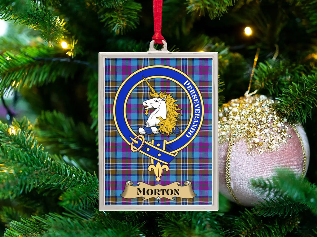 Morton clan crest Christmas ornament in a silver frame on a tartan background