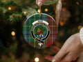 Muir family crest tartan Christmas ornament on Christmas tree — 3-inch round ceramic