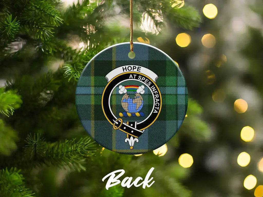 Munro Dread God clan crest plaid pattern ornament — 3-inch round ceramic with tartan background