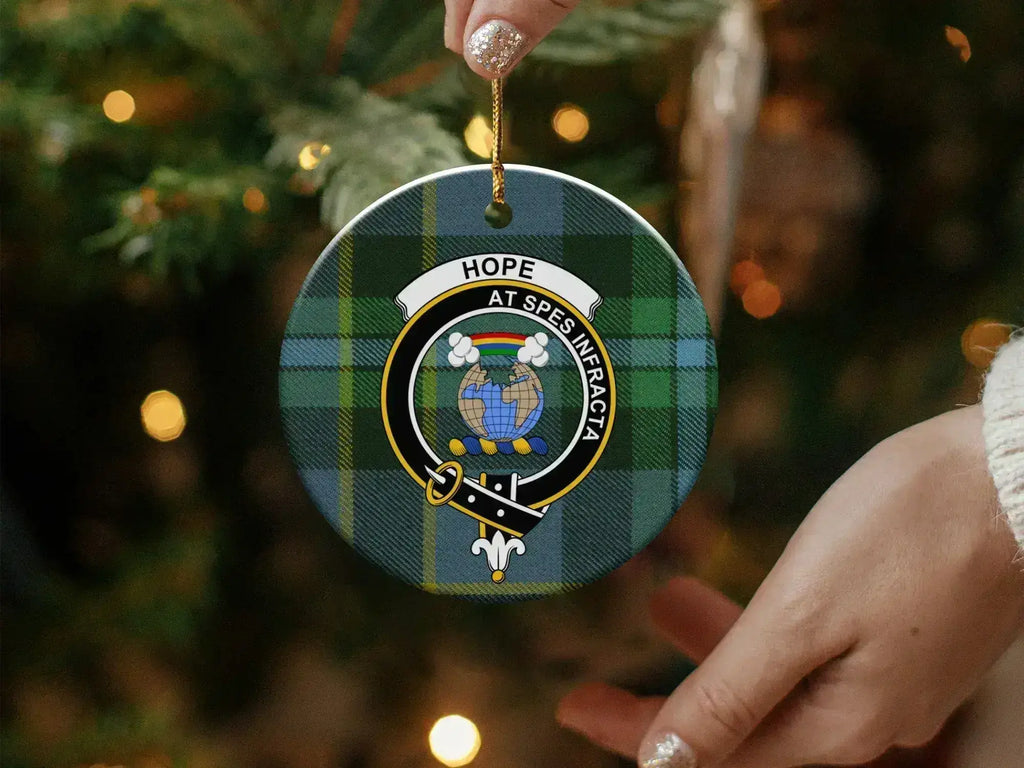 Munro clan crest inscribed ceramic ornament — Dread God tartan design on 3-inch round