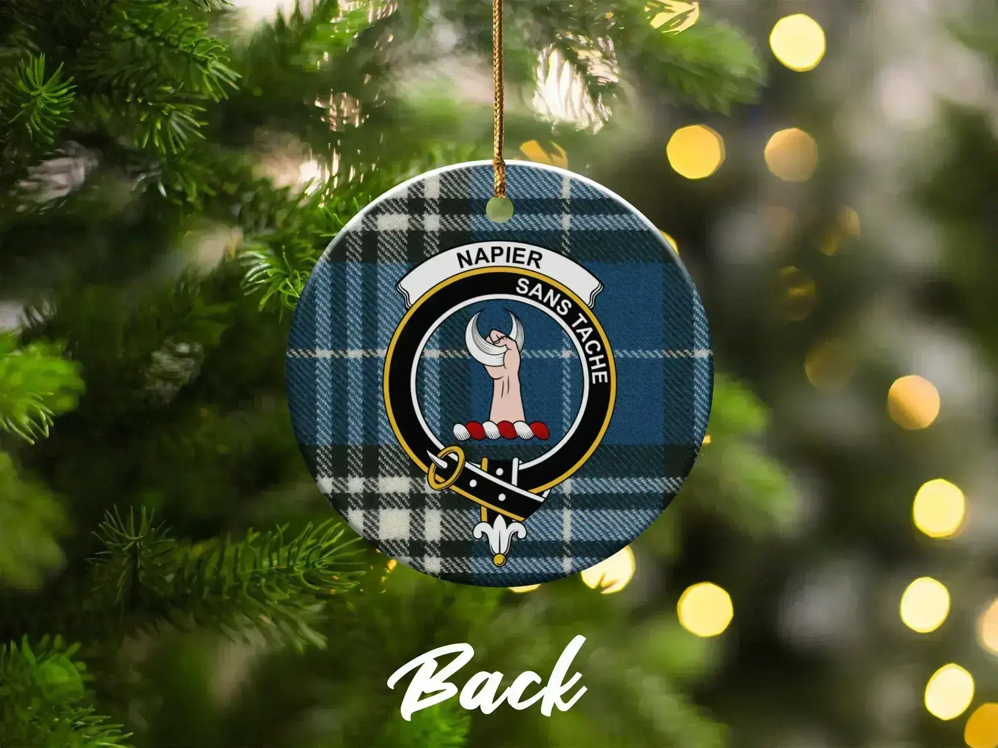 Clan Napier ceramic Christmas ornament hanging on tree — blue tartan print
