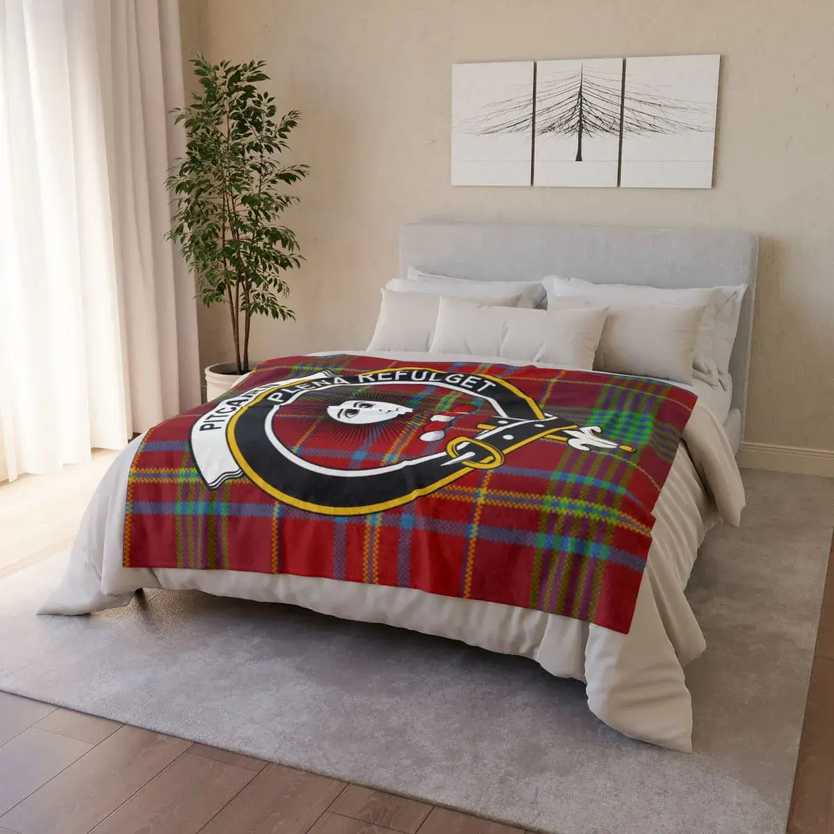 Pitcairn clan crest tartan throw draped on sofa — printed design, white reverse, hemmed edges