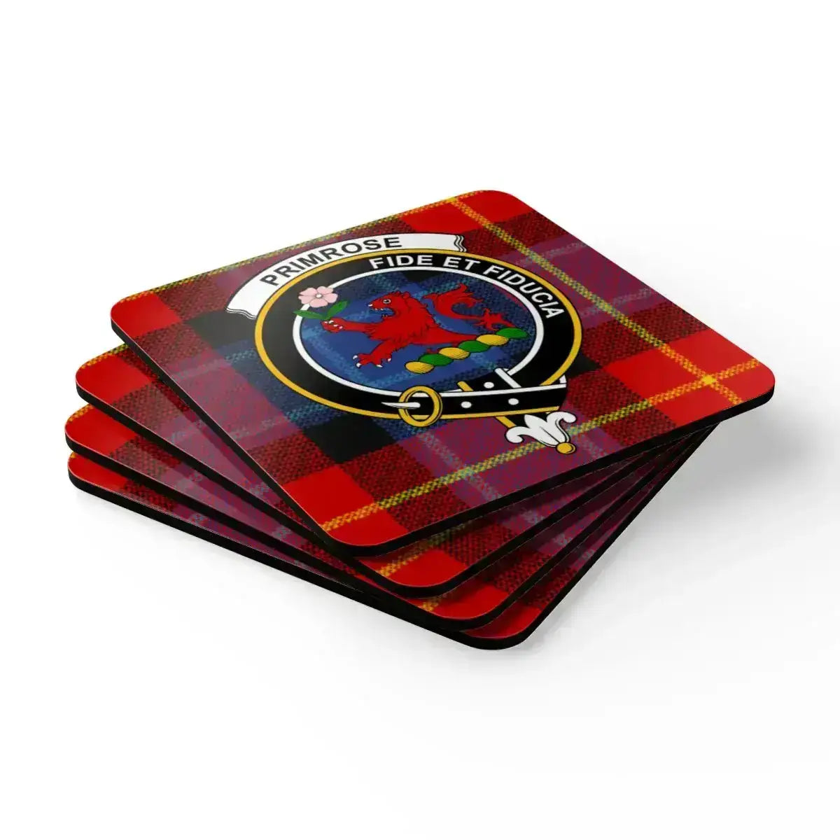 Primrose coaster set in use — Scottish clan crest and tartan pattern on table