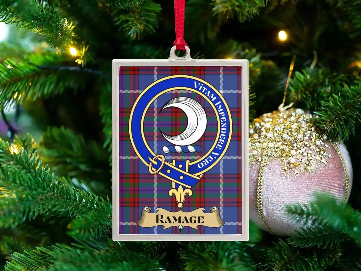 Ramage clan crest Christmas ornament in a silver frame on a tartan background