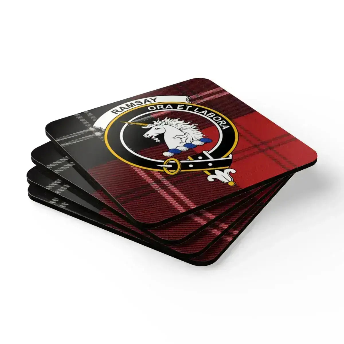 Ramsay coaster set in use — Scottish clan crest and red plaid on table