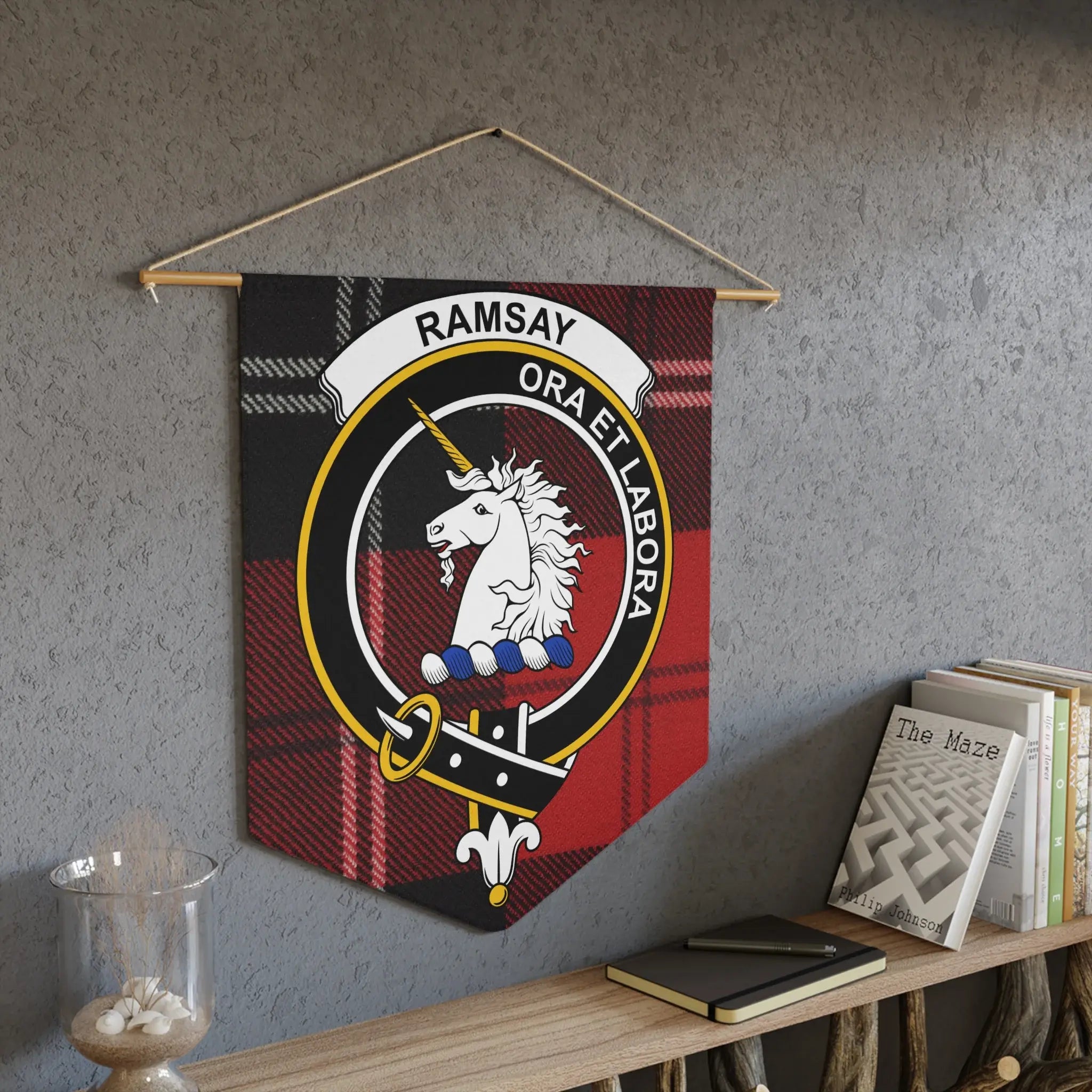 Ramsay ora et labora clan pennant displayed on wall — red tartan crest design