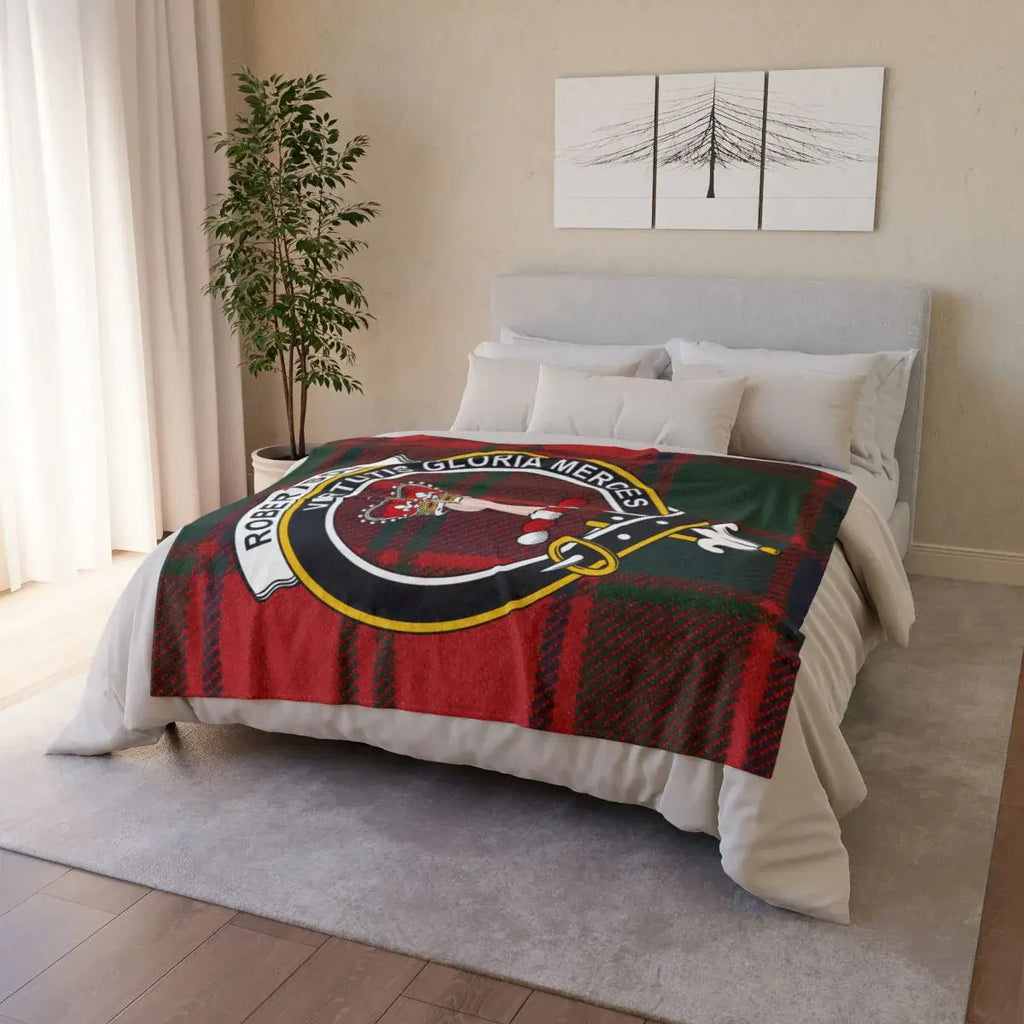 Clan Robertson throw blanket folded — showing crest and red tartan print