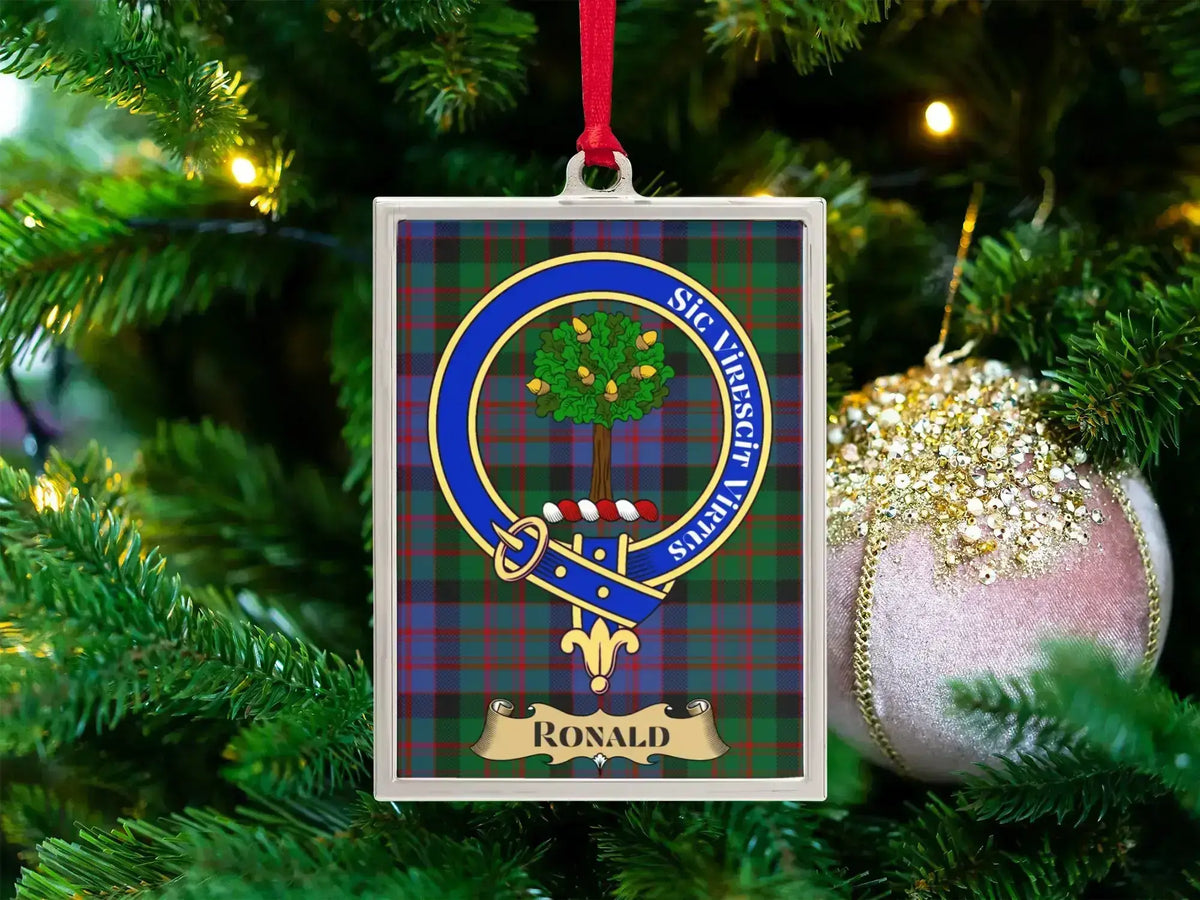 Ronald clan crest Christmas ornament in a silver frame on a tartan background