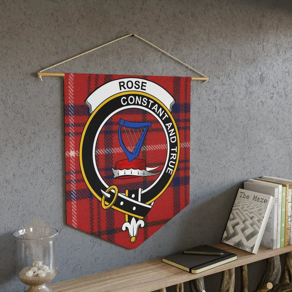 Rose constant and true clan pennant displayed on wall — red tartan crest design