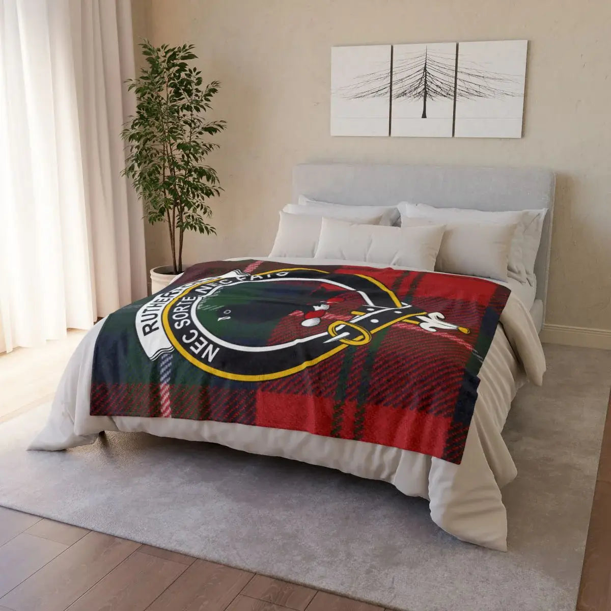 Rutherford clan crest tartan throw draped on sofa — printed design, white reverse, hemmed edges