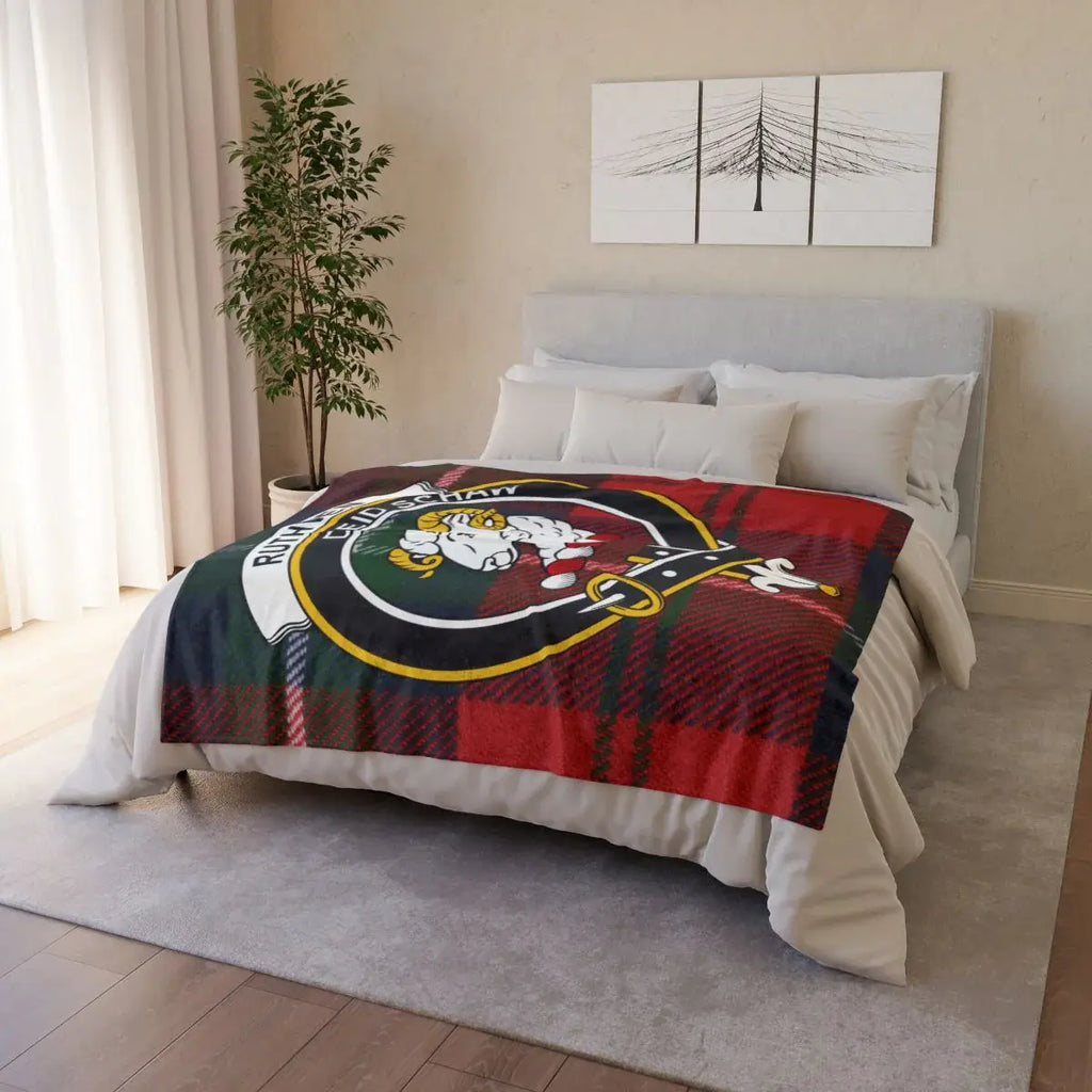 Clan Ruthven throw blanket folded — showing ram crest and tartan plaid print