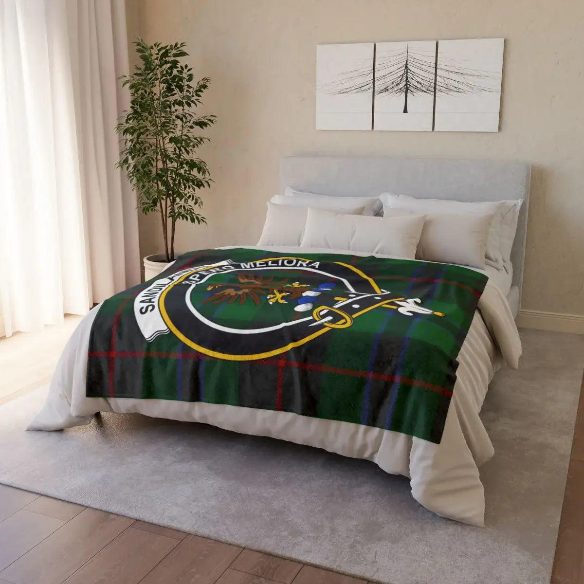 Sandilands clan crest tartan throw draped on sofa — printed design, white reverse, hemmed edges