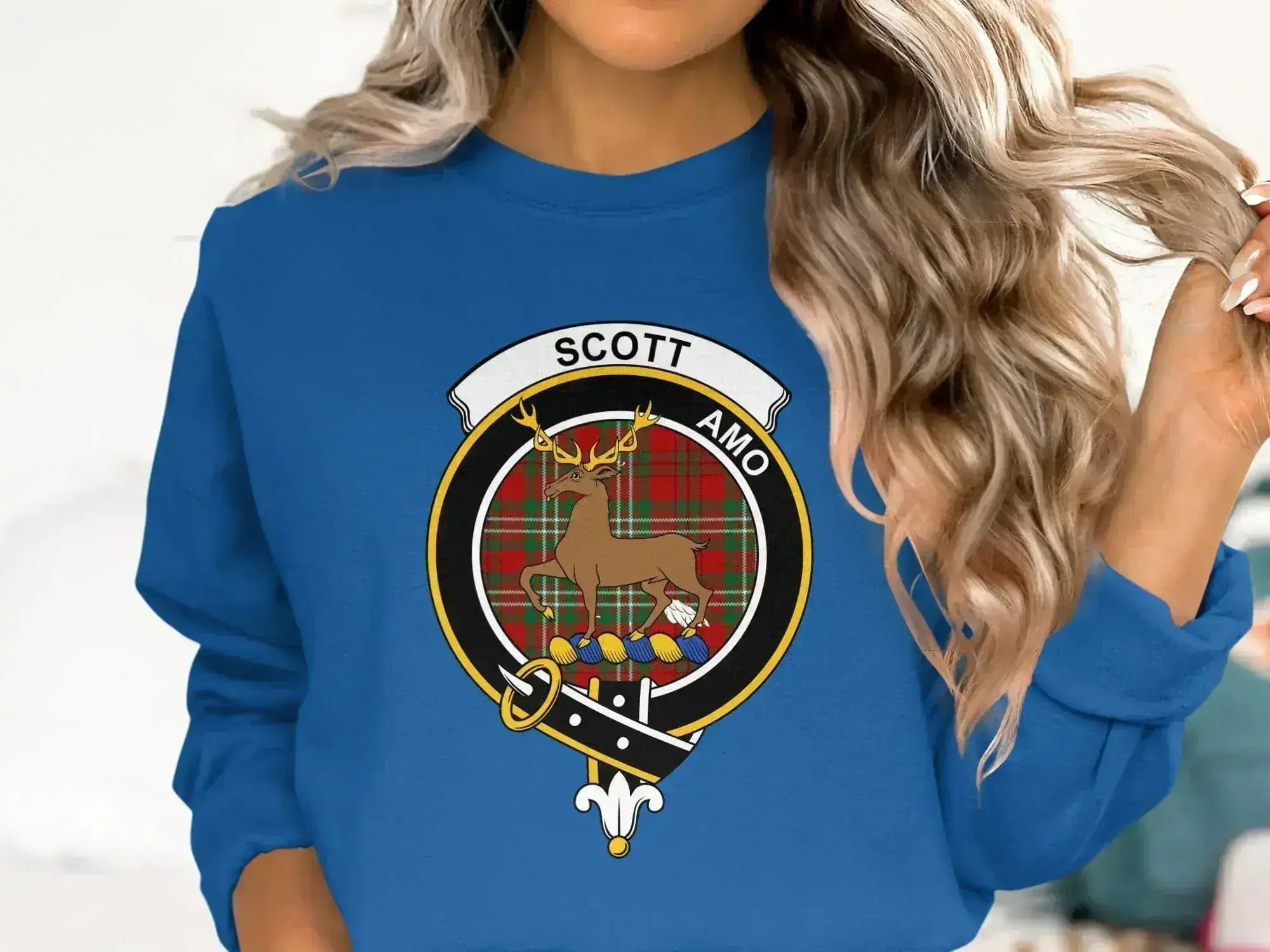 Clan Scott sweatshirt in royal blue — deer crest emblem on crewneck fleece