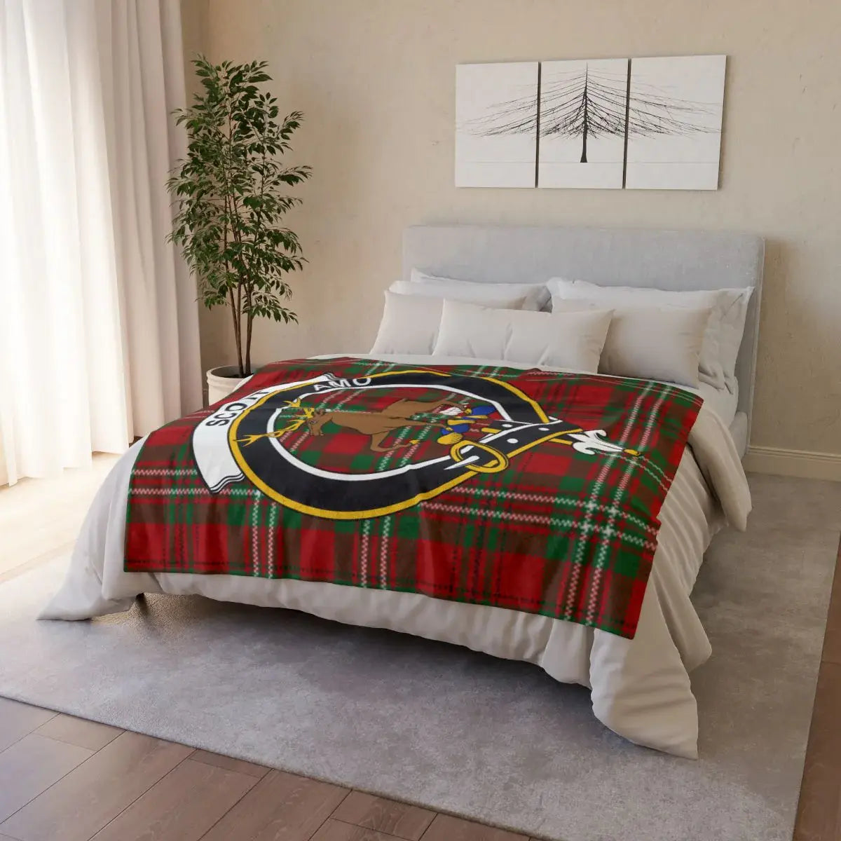 Clan Scott throw blanket folded — showing deer crest and tartan plaid print