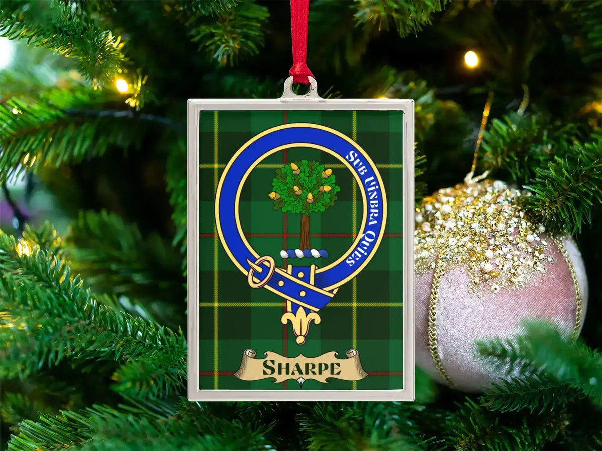 Sharpe clan crest Christmas ornament in a silver frame on a tartan background