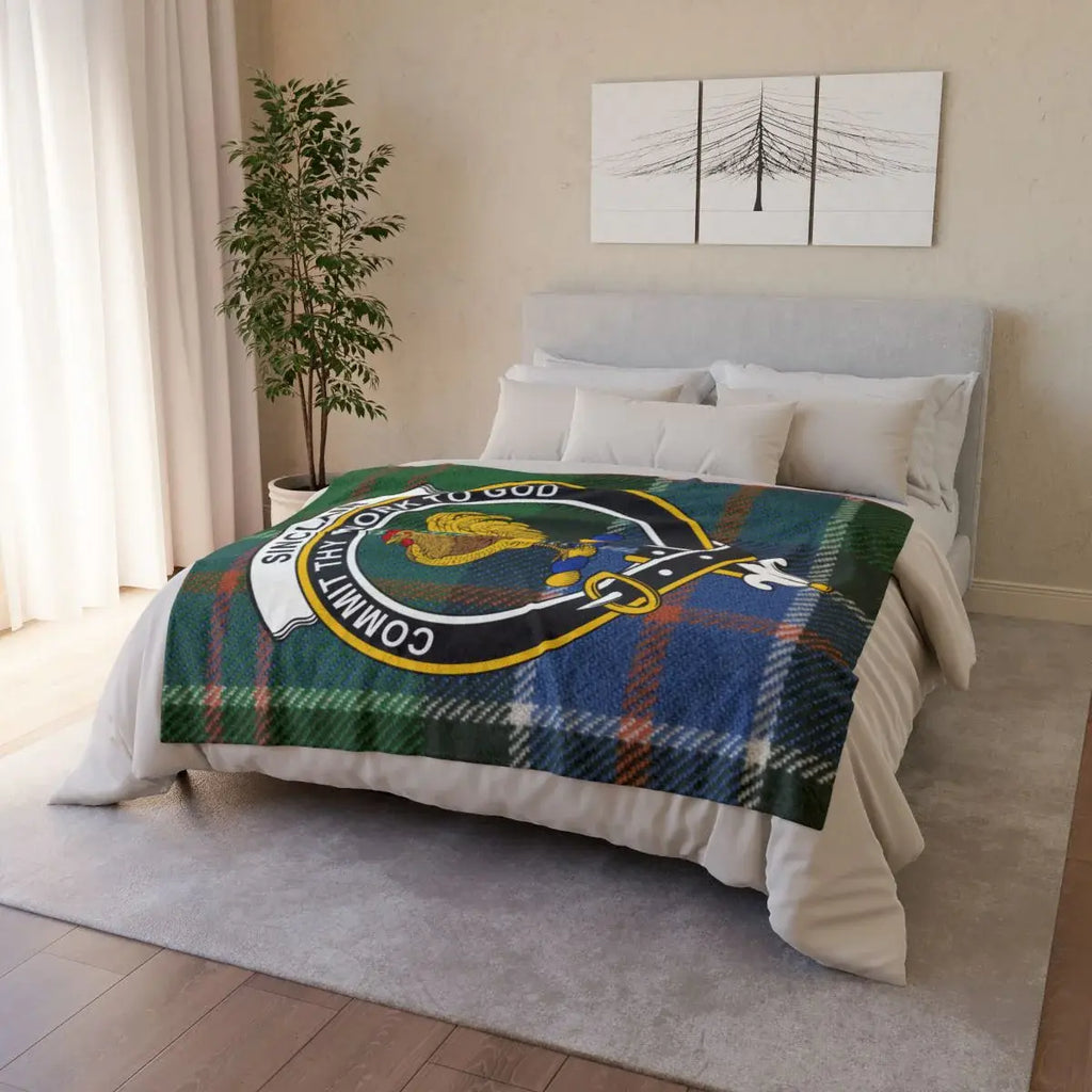 Clan Sinclair throw blanket folded — showing rooster crest and tartan plaid print