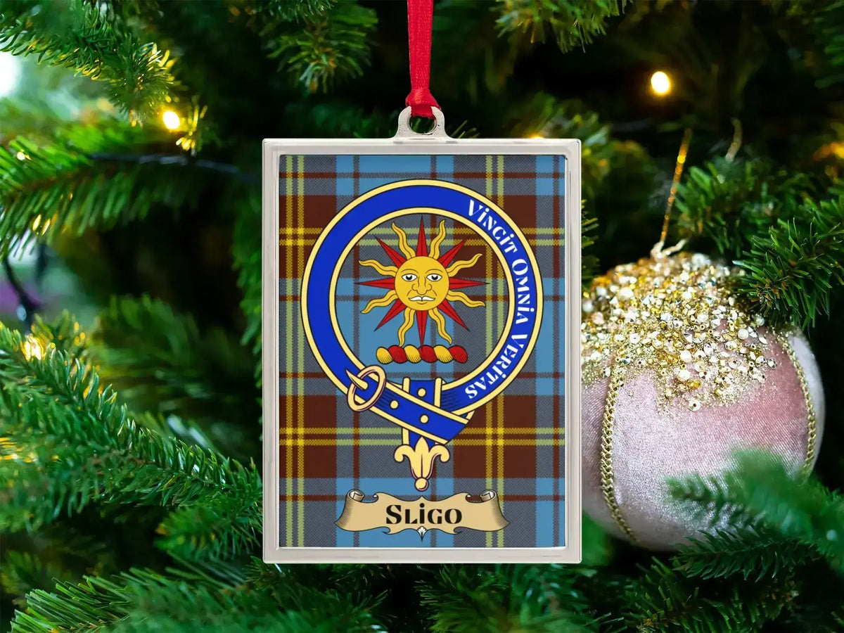 Sligo clan crest Christmas ornament in a silver frame on a tartan background