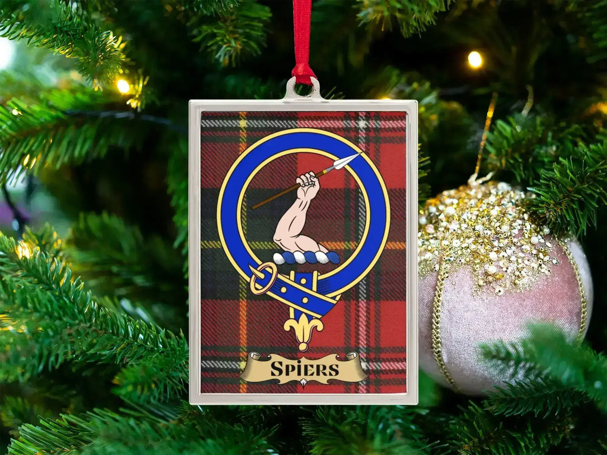 Spiers clan crest Christmas ornament in a silver frame on a tartan background