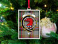 Sydserf clan crest Christmas ornament in a silver frame on a tartan background