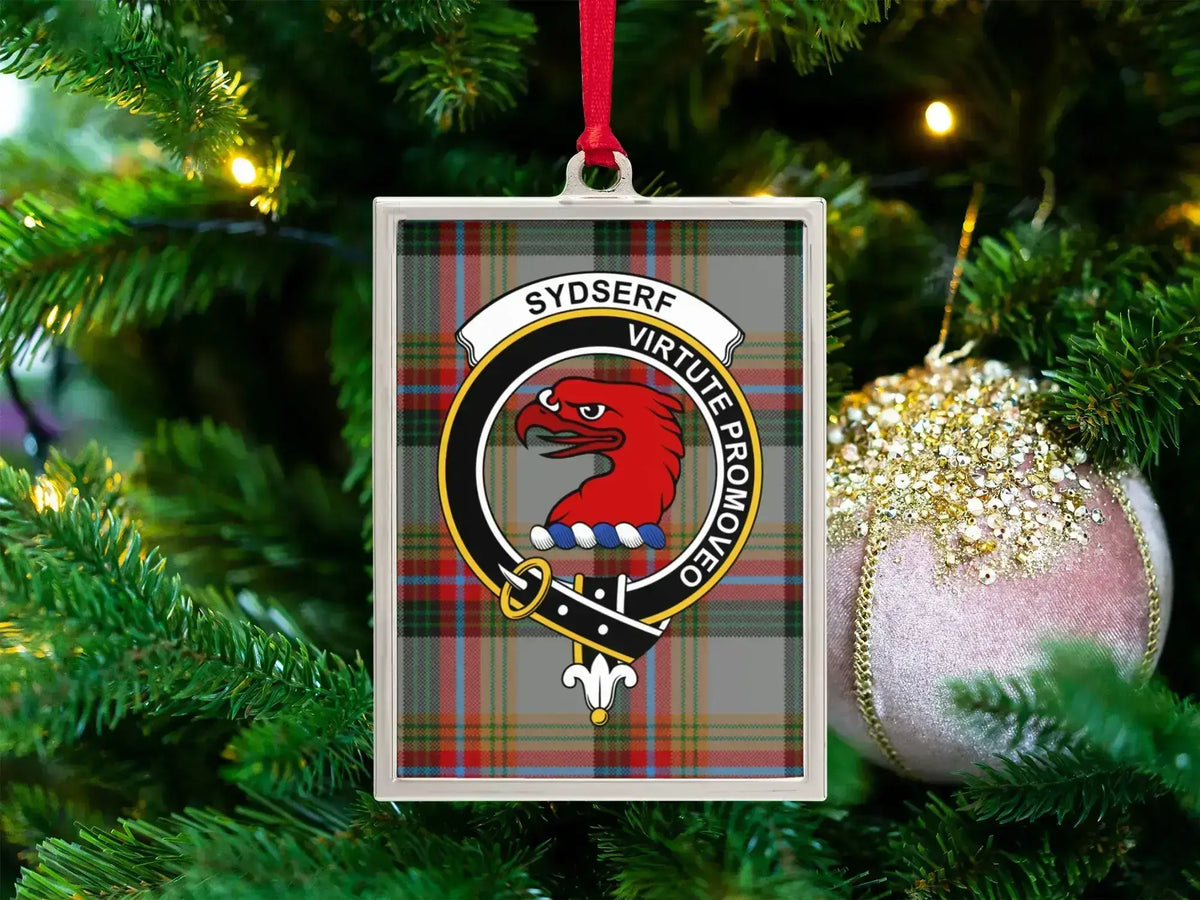 Sydserf clan crest Christmas ornament in a silver frame on a tartan background