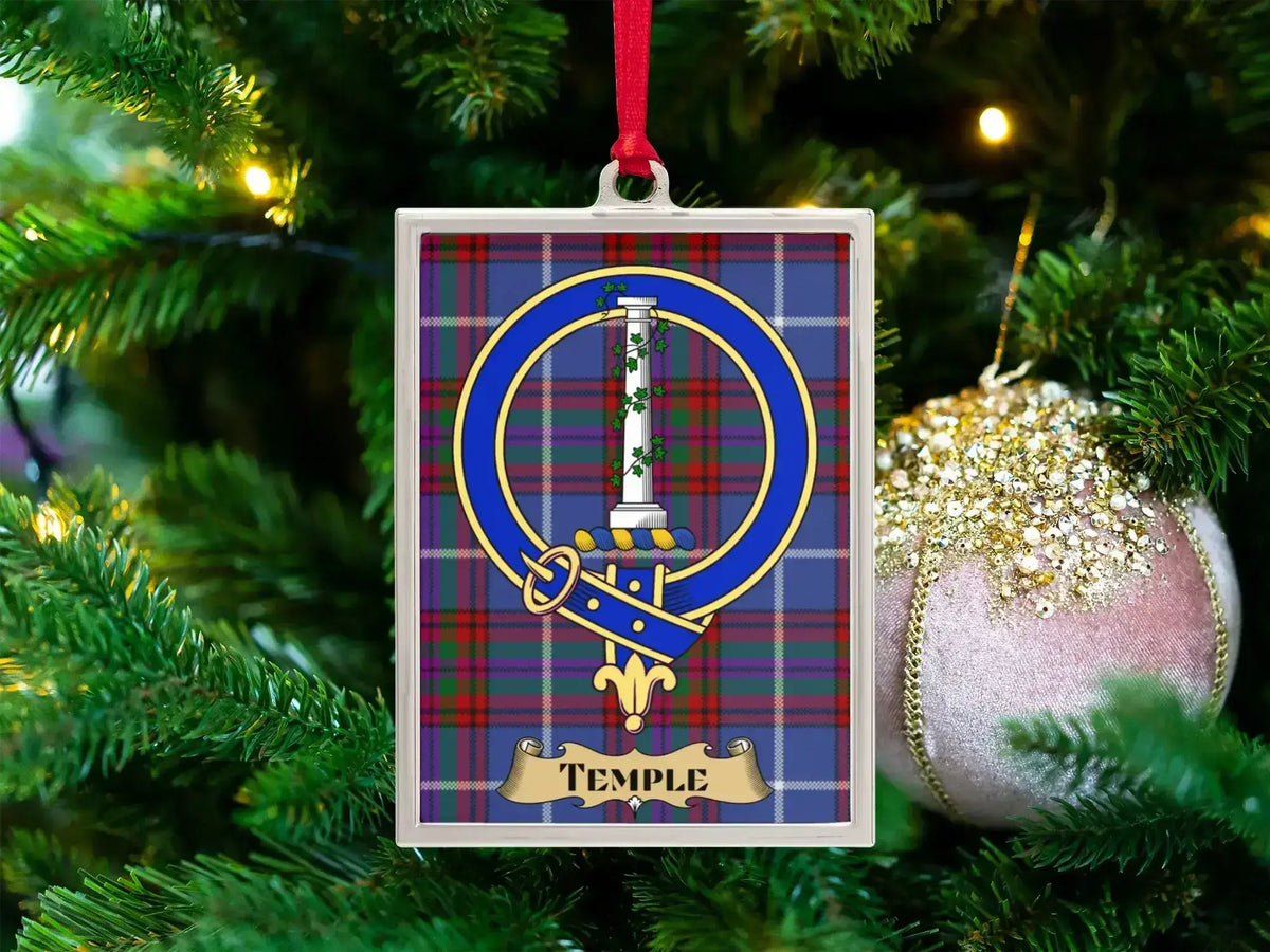 Temple clan crest Christmas ornament in a silver frame on a tartan background